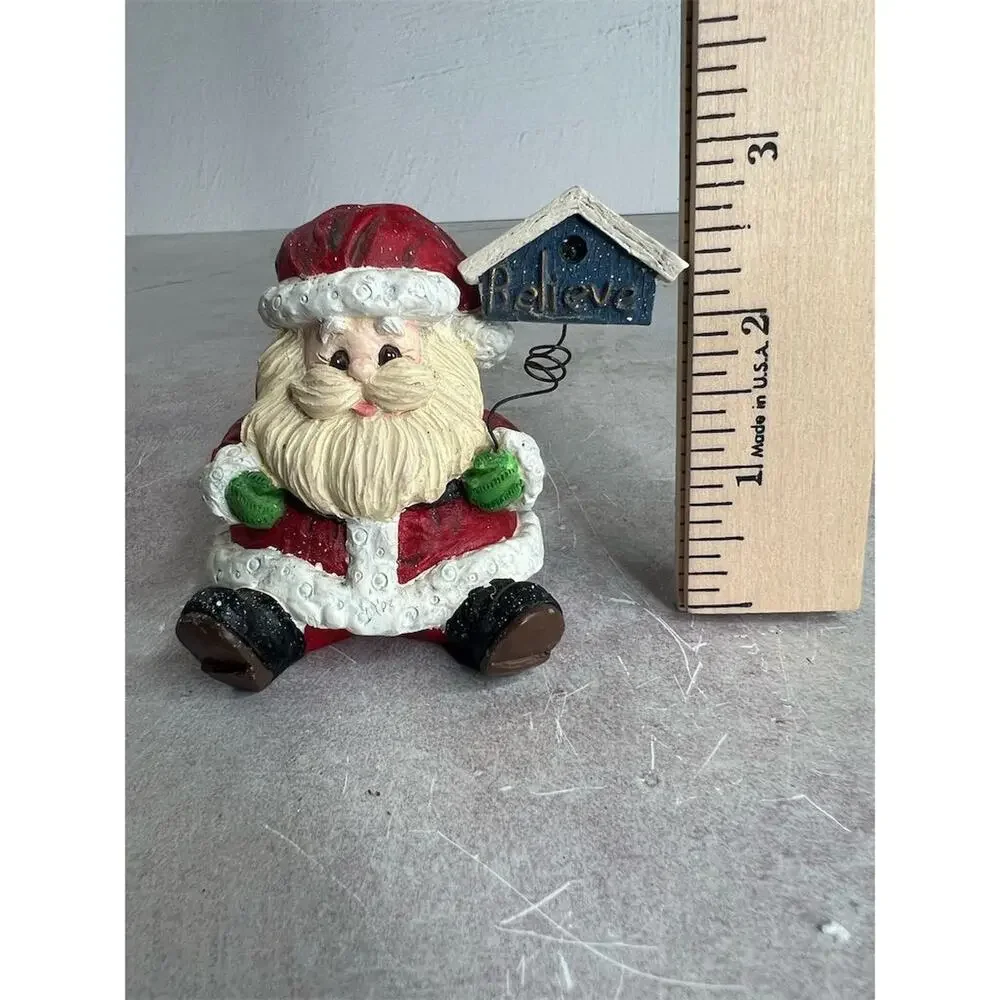 A Berry Merry Christmas Santa Claus Figurine 3